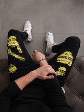 Load image into Gallery viewer, Biohazard Ripped Jeans