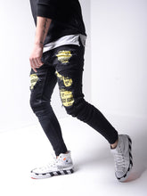 Load image into Gallery viewer, Biohazard Ripped Jeans
